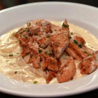 Fettuccine Alfredo · With chicken, shrimp for an additional charge.