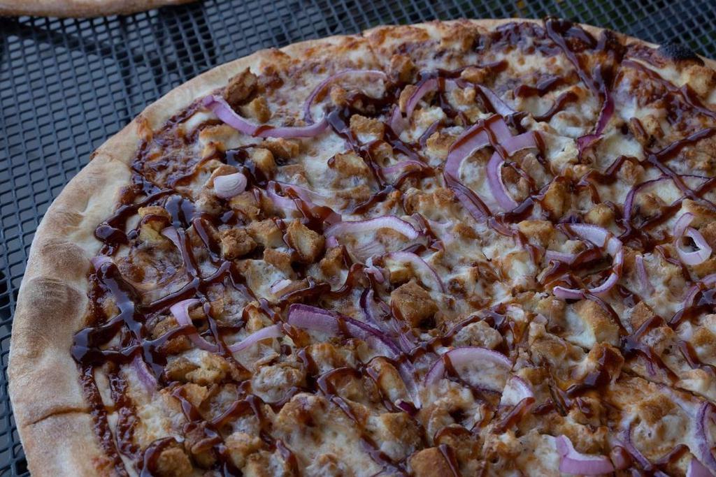 Small Bbq Chicken Pizza · BBQ sauce, breaded chicken, and red onions