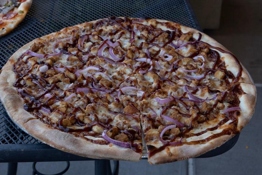 Large Bbq Chicken Pizza · BBQ sauce, breaded chicken, and red onions