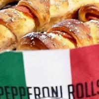 Pepperoni Rolls · Our Homemade dough rolled with layers of pepperoni and parmesan cheese. Served with a side o...