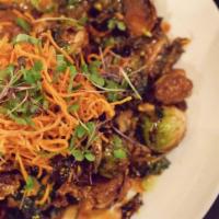 Brussels Sprouts · Local brussels sprouts, applewood smoked bacon, almonds, citrus zest, soy, agave   and chili...