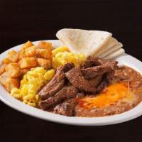 Carne Asada Con Huevos ~ · Sliced grilled steak served with scrambled eggs, beans, potatoes, and tortillas.