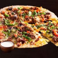 Meat Mexican Pizza ~ · We take a large ﬂour tortilla crust and top it with your choice of meat, and sprinkle it wit...