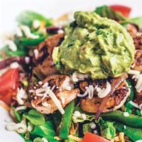 Shrimp Fajita Guacamole · Grilled shrimp sautéed with onions & green peppers on freshly chopped lettuce with tomatoes,...