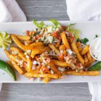 Latin Seasoned Fries · With pico or sour.