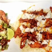 Chicken Over Rice (Halal) · Chicken breast marinated in special herbs over the grill with fried onion, tzatziki sauce an...