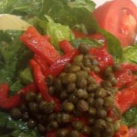 Zgara Salad · fresh cut Romaine lettuce with roasted peppers,<br /> black olives, capers, tomatoes and <br...