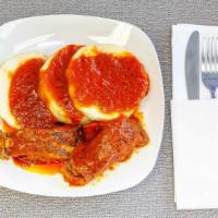 4 Slices Of Boiled Yam And Stew W/ Beef Or Chicken · 4 Slices of Boiled Yam and Stew w/ Beef or Chicken
