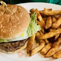 Deluxe Burger · Served with french fries, lettuce and tomato.