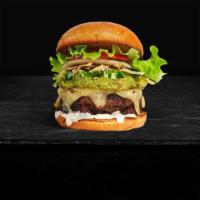 Savage Burger · Swiss Cheese, Crisp Lettuce, Tomato, Ruby's Burger Sauce, Homemade Guacamole on Grilled Parm...