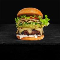 Guac & More Burger · Topped with Homemade Guacamole, Swiss Cheese, Crisp Lettuce, Tomato and Ruby's Burger Sauce.
