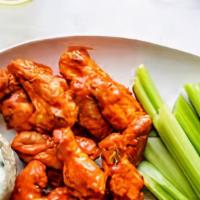 Wings · With celery.