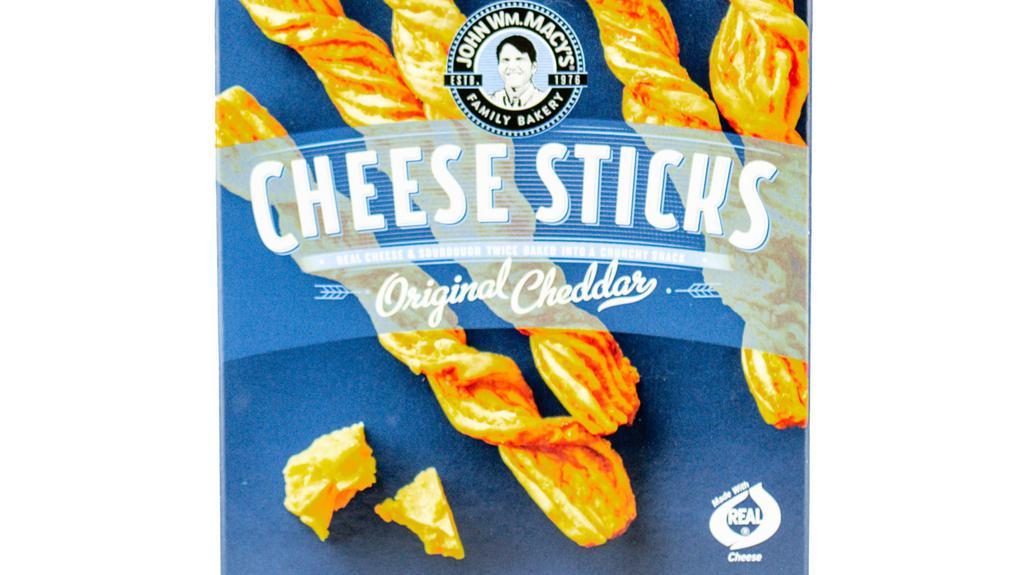 Cheesesticks | Original Cheddar · Do you ever wish cheese was crunchy? John Wm. Macy's fixed that for you. Their Original Cheddar Cheese Sticks combined cheddar and asiago with sourdough and twisted it into a delicious, baked knot. Savory with hints of herbs and spices, you won't be able to put these down!