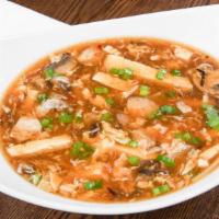 Hot & Sour Soup · Homemade chicken broth-based soup with mushrooms, tofu & bamboo shoots.