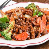 Hunan Beef · Spicy with chili, carrots, snow peas, baby corn & broccoli.