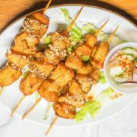 Chicken Satay (4) · Grilled tender chunks of skewered chicken, served with peanut and cucumber sauce.