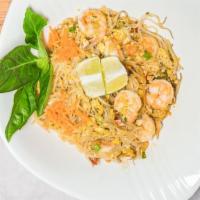 Pad Thai · Rice noodles stir-fried with shrimp or chicken, eggs, bean sprouts and spring onions. Topped...