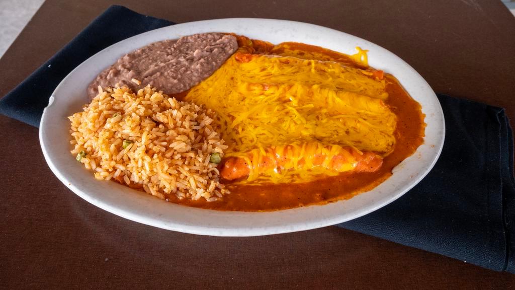 Cheese Enchiladas · (3) enchiladas. Served with Spanish rice and refried beans.