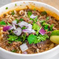 Beef Birria Ramen Noodles  · Slow cooked beef in a flavorful broth  poured over ramen noodles