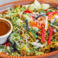 House Salad · Fresh lettuce , topped with choice of meat and toppings and tortilla strips
