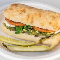 Caperese Sandwich · Ciabatta, pesto, fresh mozzarella, tomato, fresh basil, and balsamic drizzle.