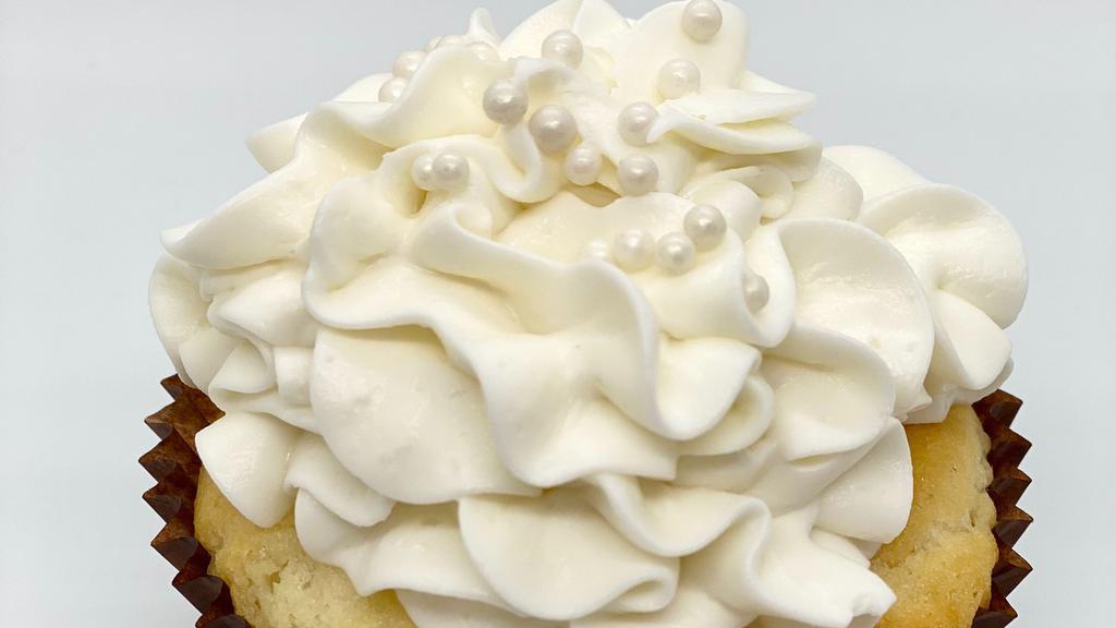 Wedding Cake Cupcake · Almond cake with almond buttercream.