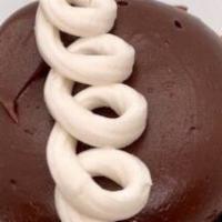 Chocolate Cream Cupcake · Favorite. Chocolate cake and fudge icing filled with vanilla buttercream.