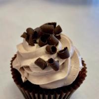 Chocoholic Cupcake · Favorite. Chocolate cake, chocolate buttercream and chocolate shavings.