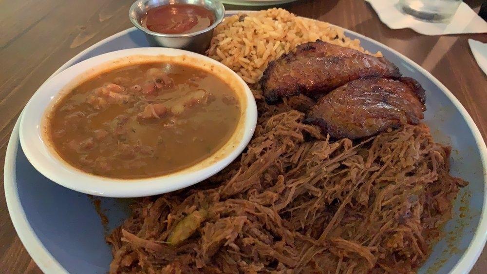 Ropa Vieja · Cuban classic. slow roasted shredded beef in a tomato base