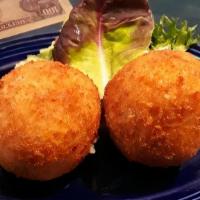 1/2 Papa Rellena (L) · Pureed Potatoes Rolled into a Ball, Lightly Panko Breaded, Then Filled with Cuban Seasoned G...
