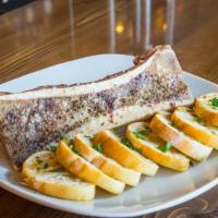 Roasted Boe Marrow · Center cut beef femur oven roasted and served with crostini