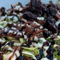 Brussels Sprout And Kale Salad · Gluten-free. Oven-roasted brussels sprouts and kale, crumbled bacon, candied pecans, dried c...