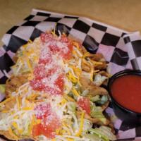 4 Beef Tacos · 4 Deep Fried Beef Tacos topped with lettuce, shredded cheese, tomatoes and parmesan cheese.