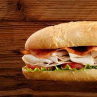 Turkey Club Sub · Turkey, bacon, and colby jack cheese with lettuce, tomato, and mayo served on 8 inch sub roll.