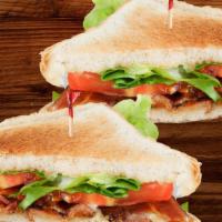 Blt · Bacon, lettuce, tomato, and mayonnaise on toasted white bread.  (chips sold separate).