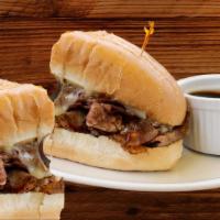 French Dip With Au Jus · London broil roast beef and provolone served on grilled sub roll with horseradish sauce and ...