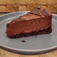 Chocolate Mousse Cake · Single serving slice of rich Belgian chocolate mousse on a chocolate cake crust topped with ...