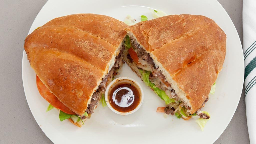 Torta Asada (Grilled Steak Sandwich) · grilled steak,lettuce,tomato,onion,jalapeno,beans,mayonnaise.