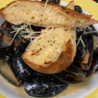 Mussels · One pound prince edwards island mussels steamed in white wine, garlic, basil and lemon butte...