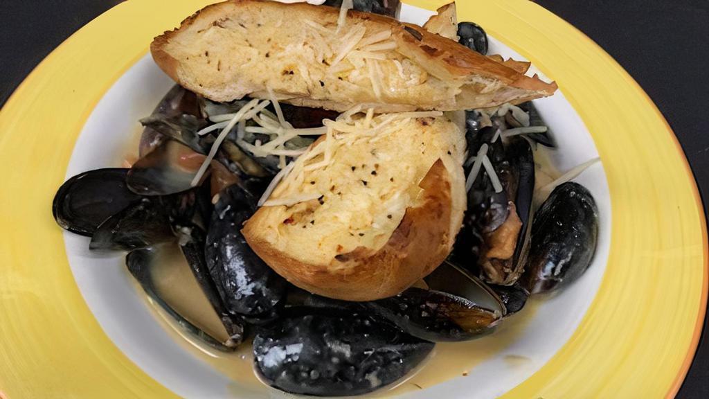 Mussels · One pound prince edwards island mussels steamed in white wine, garlic, basil and lemon butter sauce.