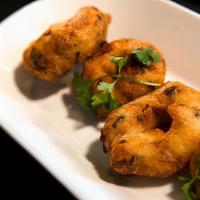 Medu Vada · Fritters made with rice and lentil flour, served with sambar and chutney. Vegan and Gluten f...