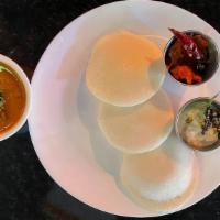 Idly (3 Pcs) · Steamed cake made with rice and lentil flour. Served with chutney and sambar. Vegan