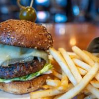 Wagyu Burger · Indulgent ground wagyu seared to perfection then topped with mushroom conserva, caramelized ...