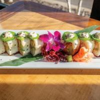 Sesame Street · Tempura shrimp, avocado, cream cheese, spicy crab, and jalapeños wrapped in soy paper, then ...