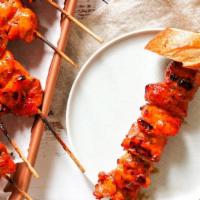 Momma Z’Z Chicken Kabob Plate  · Momma Z’s savory grilled chicken kabob chopped then served on a bed of saffron white rice, f...