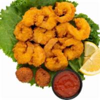 Shrimp Basket · Grilled shrimp tossed in Cajun seasoning or hand-breaded shrimp fried golden and served with...