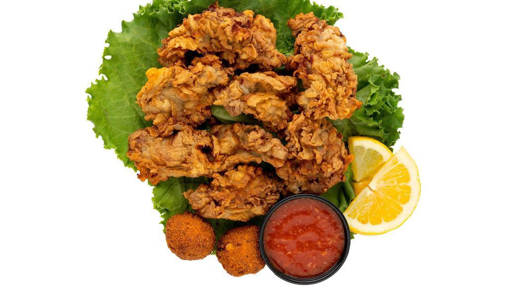 Fried Oyster Basket · Our fresh oysters, seasoned and battered, fried golden and served with hush puppies and your choice of cocktail or tartar sauce