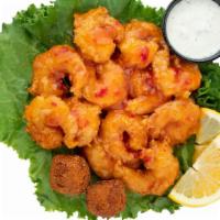 Buffalo Shrimp Basket · Grilled or hand-breaded fried shrimp tossed in any of our Signature Sauces served with hush ...