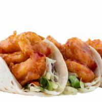 Buffalo Shrimp Tacos · Grilled or hand-breaded shrimp in a flour tortilla topped with any of our Signature Sauces a...