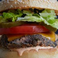 Bobby'S Veggie Burger · BBQ wild mushrooms, chickpeas and quinoa, with American cheese, tomato, pickles, romaine, re...